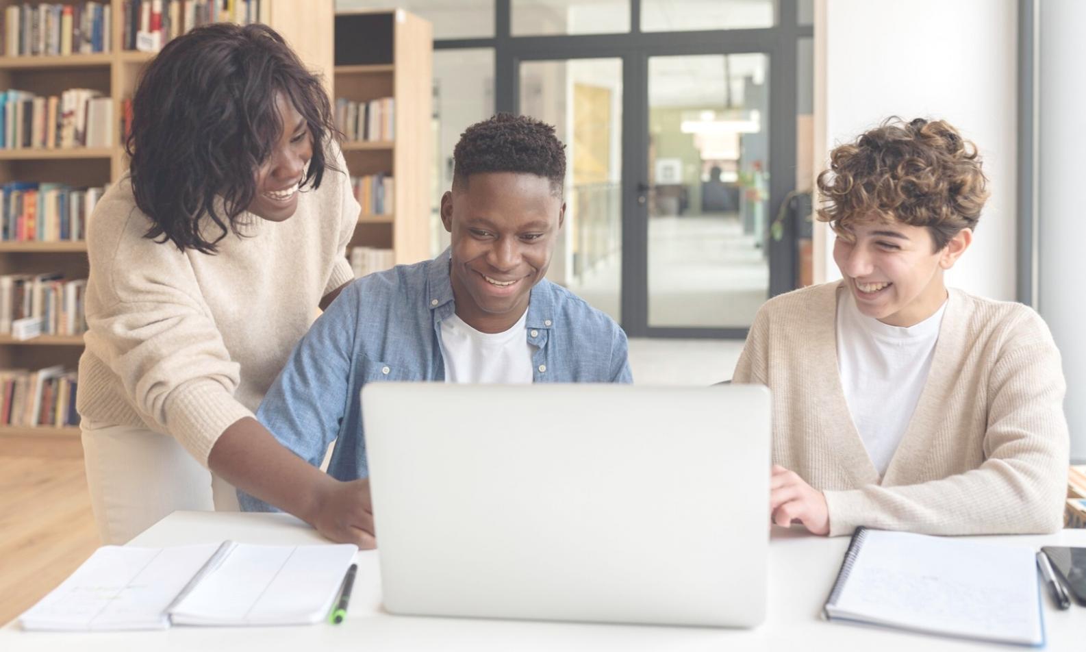 Student working through financial planning tutorials on laptop
